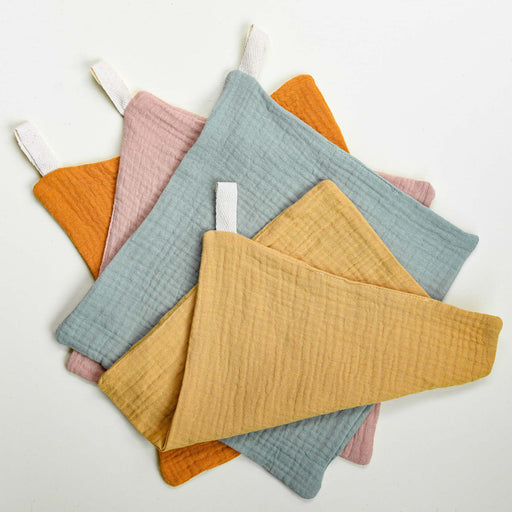 Organic cotton muslin washcloth with hanging loop. Orange, Pink, Blue, and Yellow. 