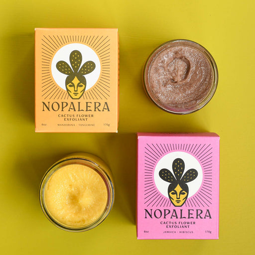 Two clear jars of cactus flower exfoliant. One in mandarina. One in hibiscus. From Nopalera.