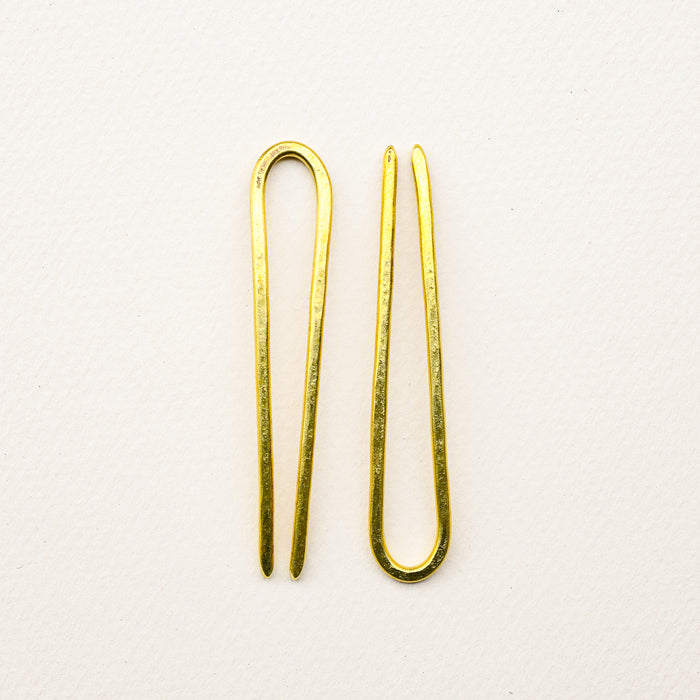 Handmade brass tiny duo bun pins.