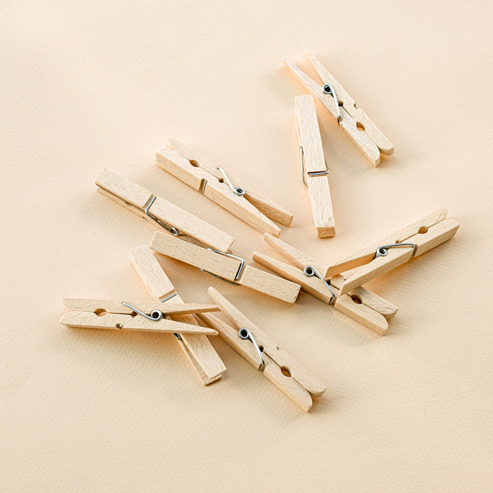 Group of classic wooden clothes pin.
