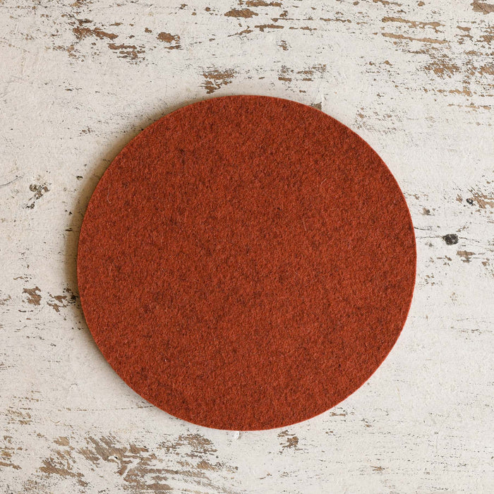 Mahogany wool felted trivet by Graf Lantz.