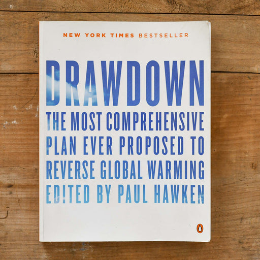 Book from Penguin books. Drawdown by Paul Hawkin. Reverse Global Warming. 