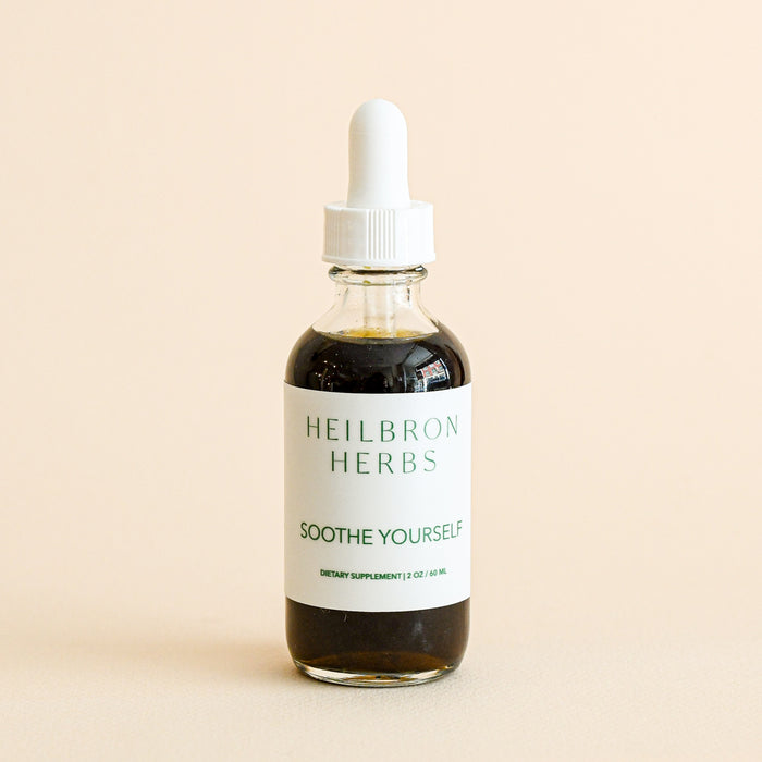 Glass bottle and dropper for Soothe Yourself tincture by Heilbron Herbs. Made in Marshall, NC.