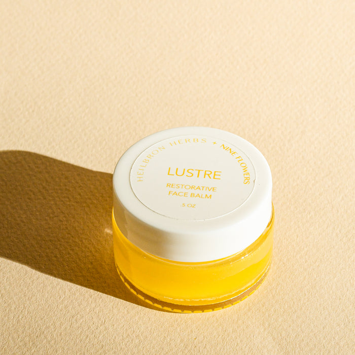 Glass jar of Lustre restorative face balm by Heilbron Herbs. Made in Marshall, NC by herbalists.