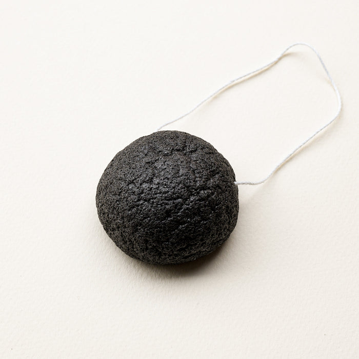Round konjac face sponge with string to hang. Compostable.