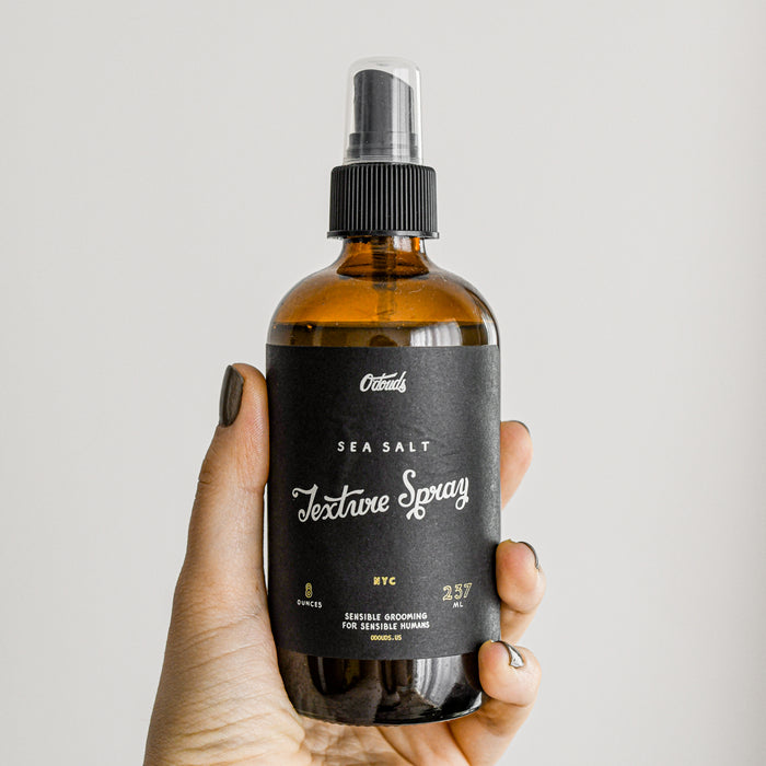 O'douds sea salt texture spray in amber glass bottle.