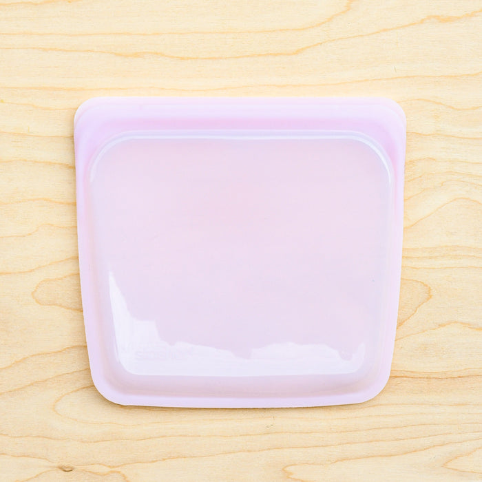 Stasher silicone medical and food grade safe reusable plastic bags. Sandwich flat bags in Pink.