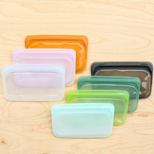 Stasher silicone medical and food grade safe reusable plastic bags. Snack flat bags in various colors. 
