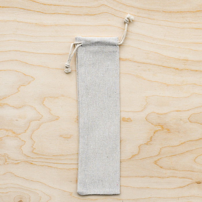 Canvas pouch for straw travel with drawstring closure.