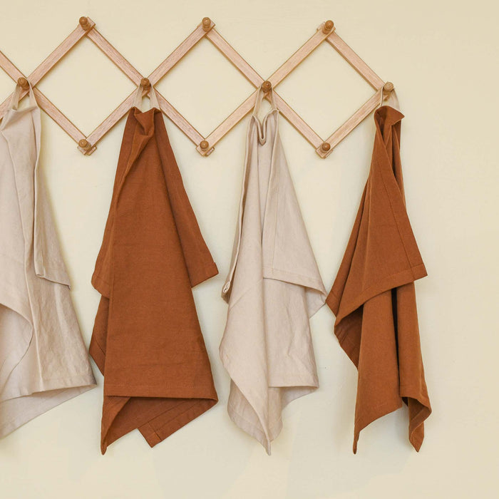Terra Cotta and Natural organic cotton dish towels. Hanging loop. Ronny Bass and Ware collaboration.