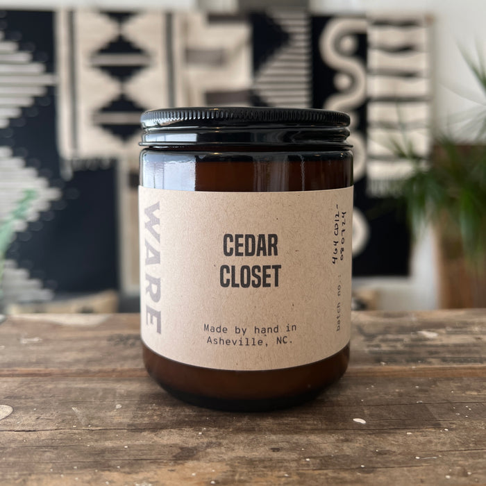 An 8 ounce candle in a reusable amber glass jar. It is scented with organic essential oils of lavender, cedar, bergamot, and vetiver.