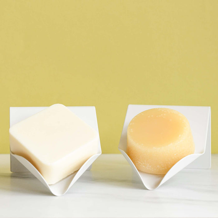 White dip shampoo and conditioner bar drainer set. Designed by Dip.