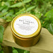 Golden tin with white label of citronella lemongrass bug candle. From Slow North. Not Today, Bugs. Bug repelling candle.