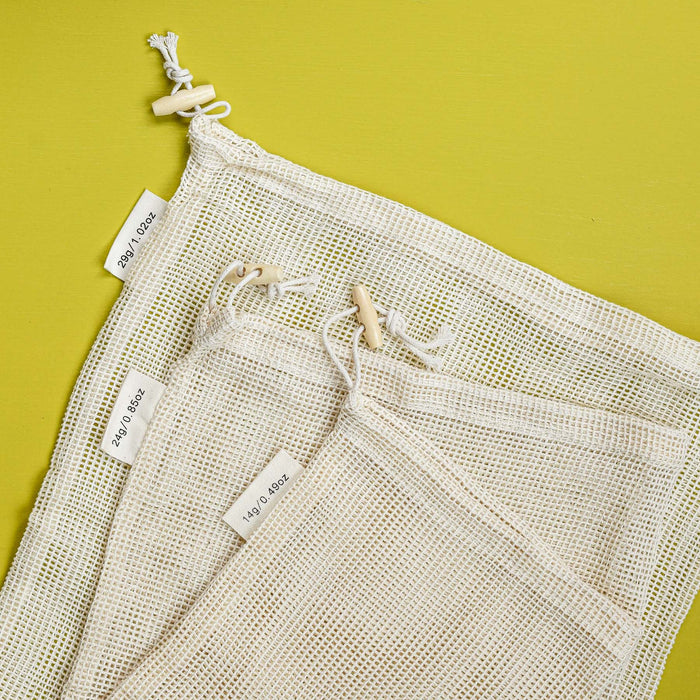 Set of 3 organic cotton mesh drawstring close produce bags with tare weight values. 