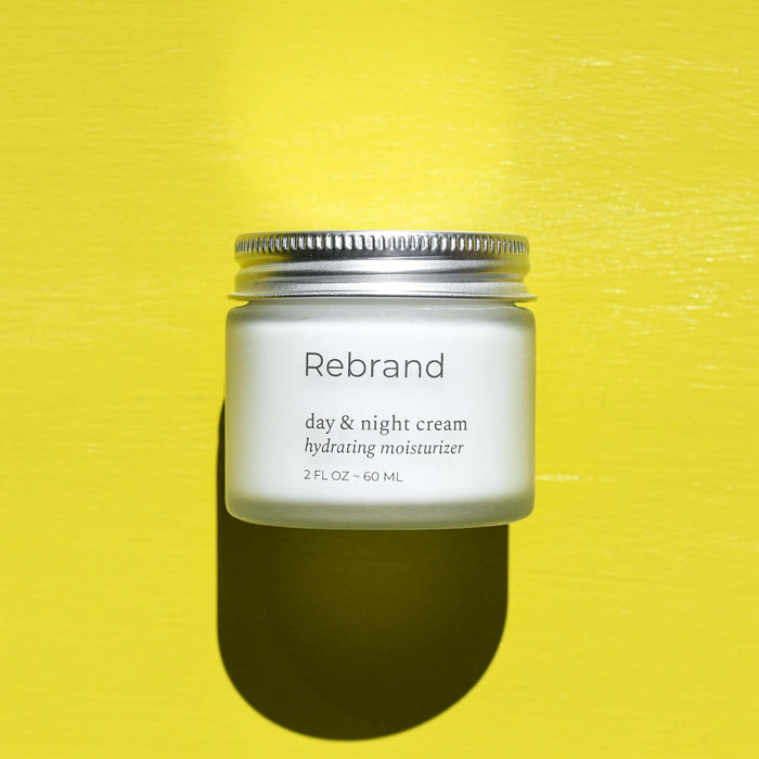 Day and night facial hydrating moisturizer from Rebrand in a glass jar.