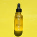Glass dropper bottle with organic facial oil from Rebrand. 