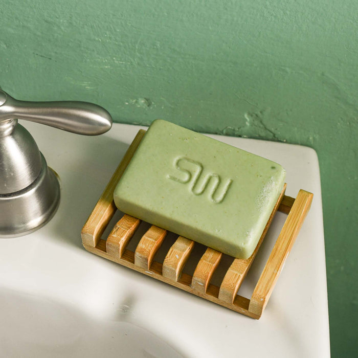 bamboo soap tray with local soap sitting on top.