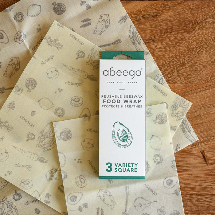 Various beeswax wrap sizes. Packaging and the product unwrapped. From Abeego.
