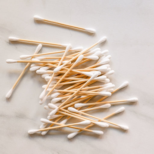 Various bamboo compostable q-tips unboxed.