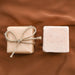 Lavender geranium bath bombs made locally in Asheville, NC.  One shown wrapped, one shown unwrapped.