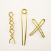 Various handmade brass bun pins for hair. 