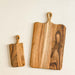 Loop handled cutting boards. Pictured small and large. Made of caro caro wood.