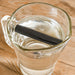 Activated charcoal water filter in a pitcher on water. From Black and Blum.