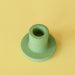  Handmade green or jade colored concrete candlestick holder. 