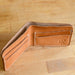 Handmade leather wallet in natural. Made in the mountains of Boone, NC,