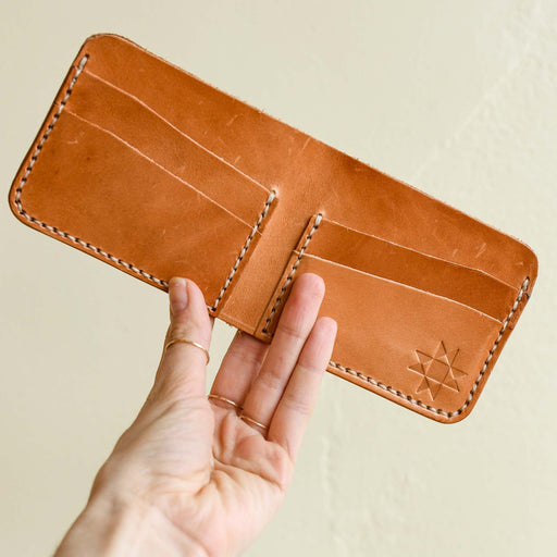 Handmade leather wallet in natural. Made in the mountains of Boone, NC,
