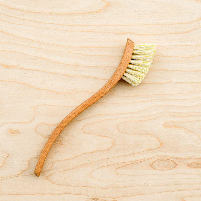 Beachwood handle and agave bristle dish brush. Curved for easy cleaning.