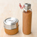 Glass lunch bowl with corresponding glass and cork water bottle. From Black and Blum.
