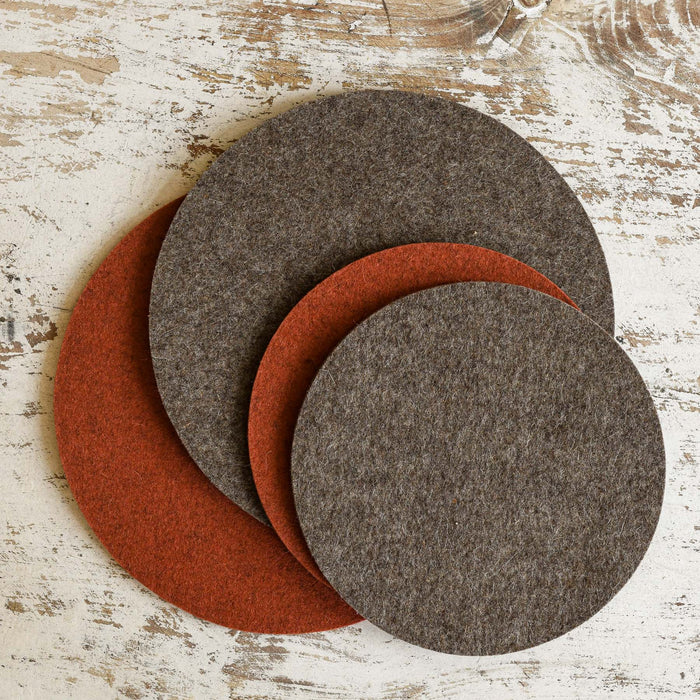Graf Lantz wool felted trivets in Ash Brown and Mahogoney. 