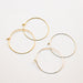 Gold and Silver pairs of hoop earrings. Handmade in Asheville, NC. 