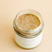 Open lid looking down into jar of ashwagandha powder. From Heilbron Herbs.