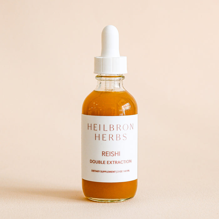 Reishi Heilbron Herbs tincture in glass bottle and dropper. Made in Marshall, NC.