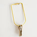 Brass bend key ring hanging off nail with keys attached. Screw closure.