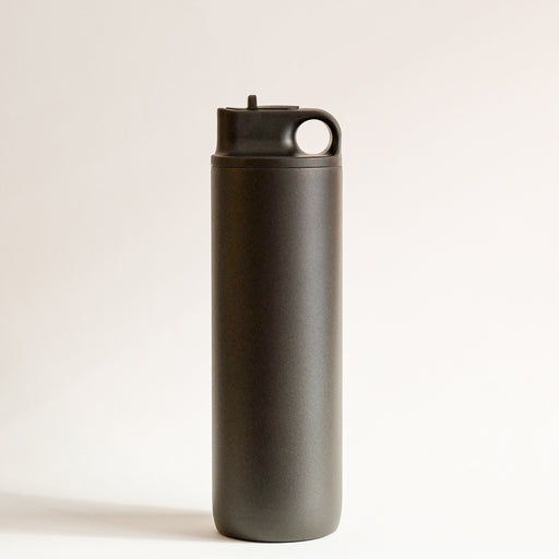 A black stainless steel insulated water bottle with a folding spout. Kinto brand.