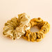 Gold and Sand organic cotton scrunchies. By Kooshoo.
