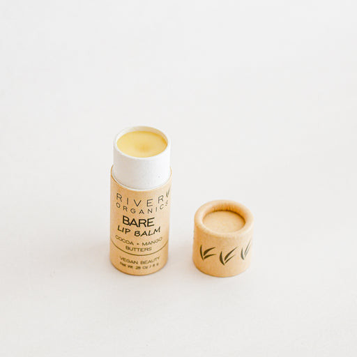Vegan lip balm. Mousterizing coca and mango butters. Compostable packaging. from River Organics. Made in Wilmington, NC.