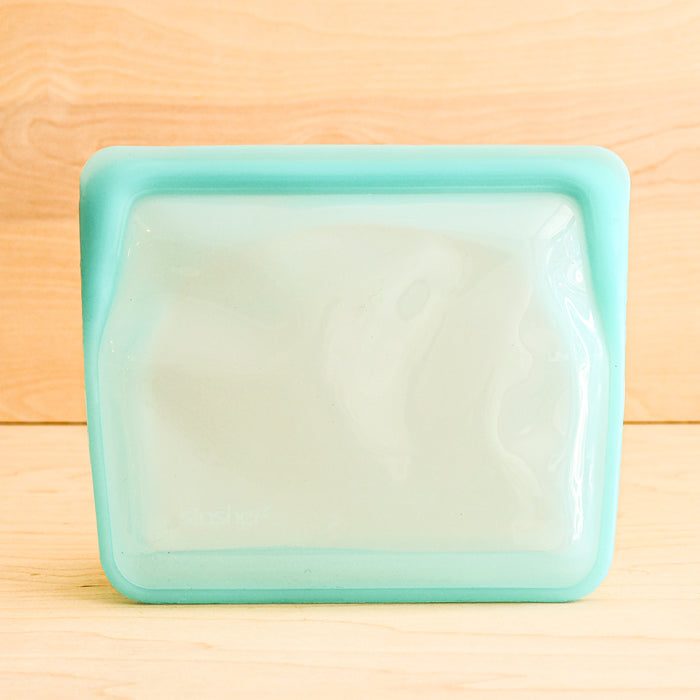 Stasher silicone medical and food grade safe reusable plastic bags. Mid stand up in Aqua.