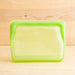 Stasher silicone medical and food grade safe reusable plastic bags. Mini stand up in Green.
