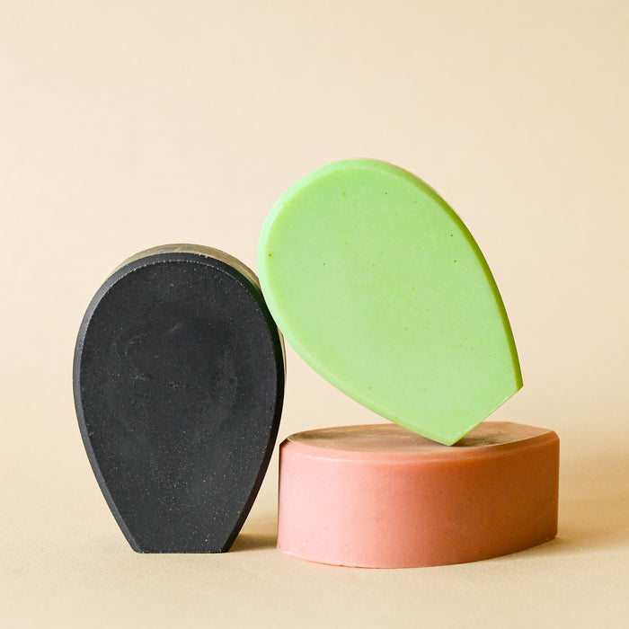 Three Nopalera cactus bar soaps stacked against each other.