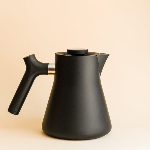 Black stovetop kettle and tea steeper with temperature gage. From Fellow. 
