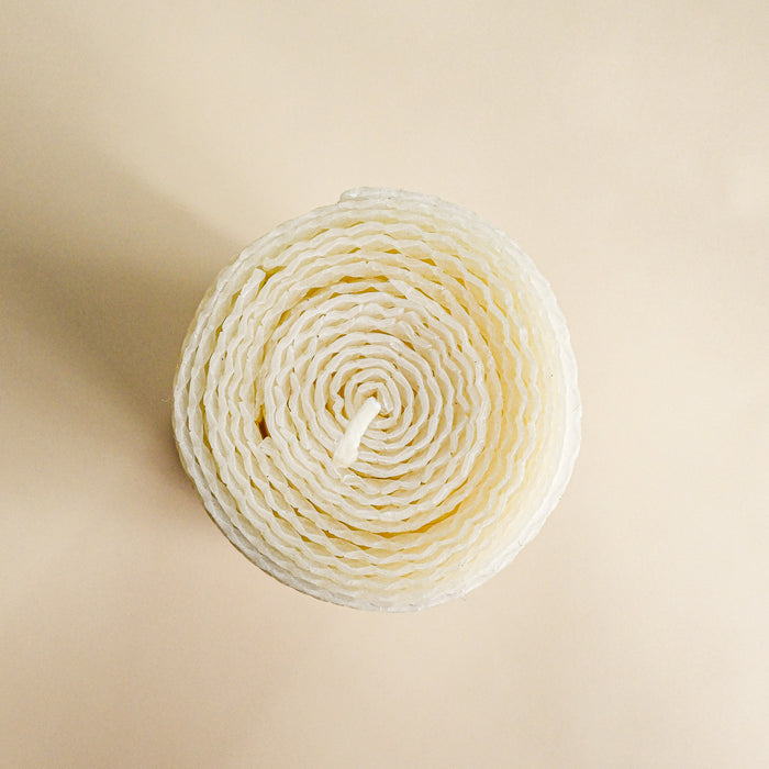 Rolled dripless beeswax candle with cotton wick. Made in Black Mountain, NC.