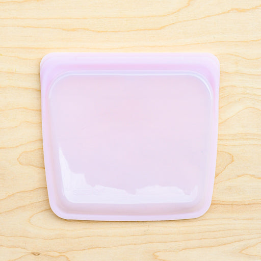 Stasher silicone medical and food grade safe reusable plastic bags. Sandwich flat bags in Pink. 