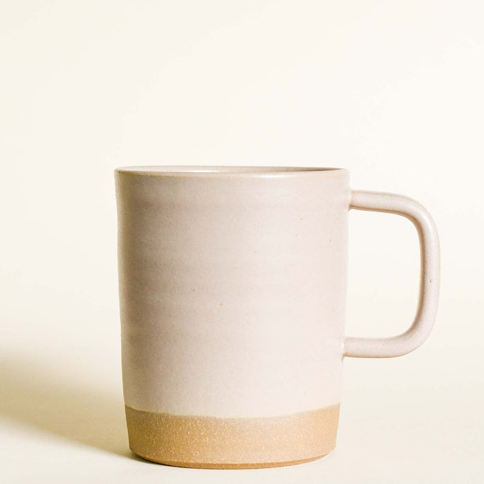 Pale blush ceramic mug.