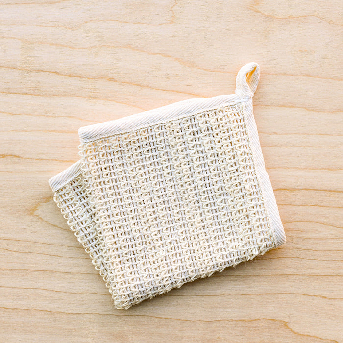 Sisal washcloth with cotton loop for drying. 