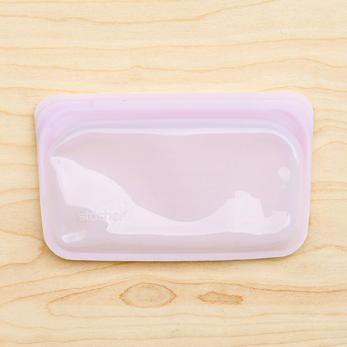Stasher silicone medical and food grade safe reusable plastic bags. Snack flat bags in Pink. 