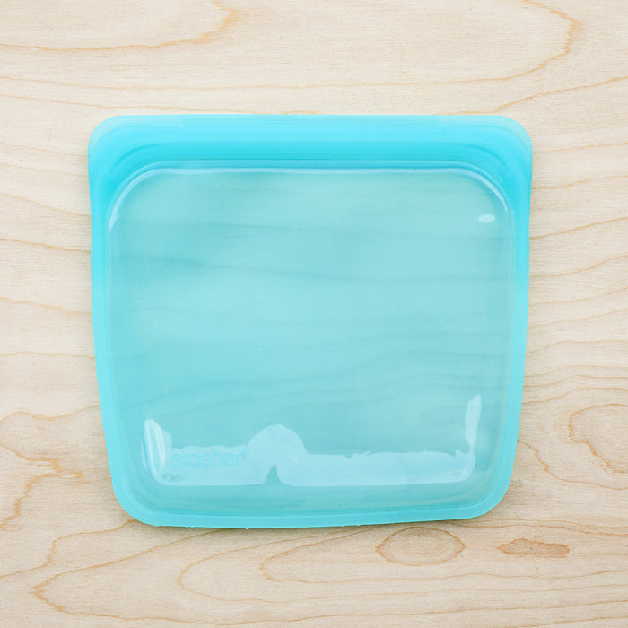 Stasher silicone medical and food grade safe reusable plastic bags. Sandwich flat bags in Aqua. 